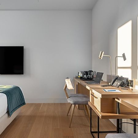 Hellenic Vibes Smart Hotel Atenas Exterior foto A room at the hotel