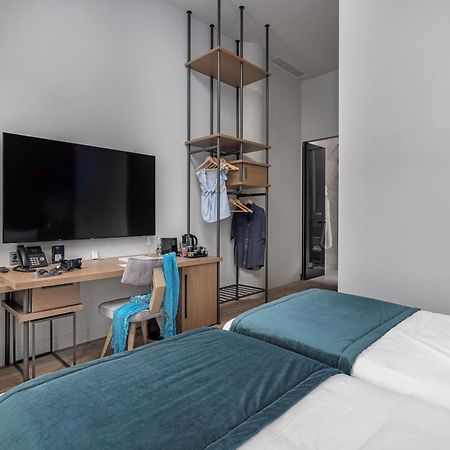 Hellenic Vibes Smart Hotel Atenas Exterior foto A room at the hotel