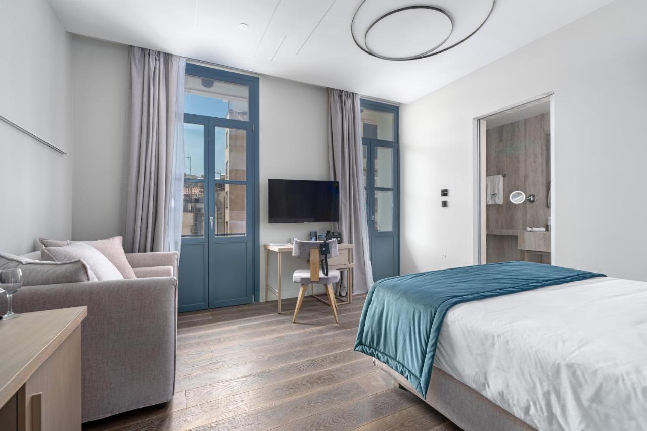 Hellenic Vibes Smart Hotel Atenas Exterior foto A room at the hotel