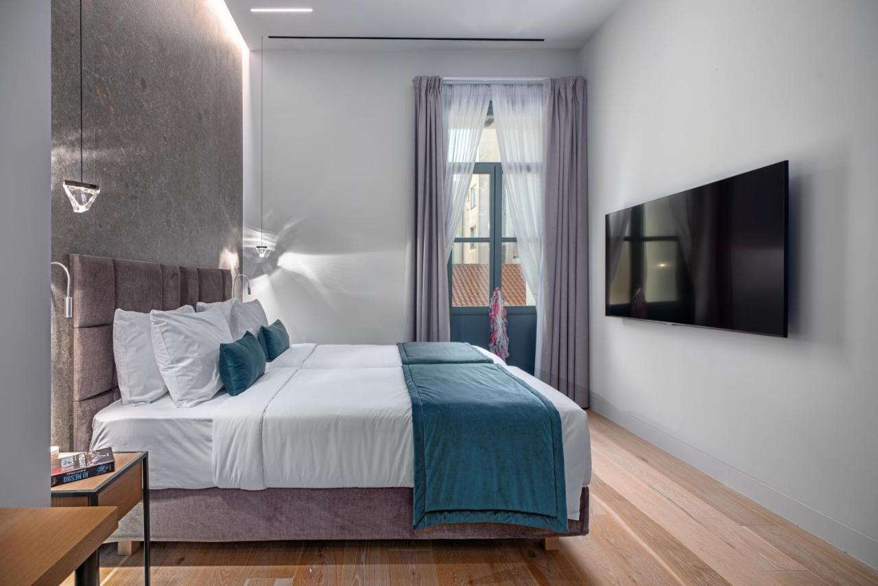 Hellenic Vibes Smart Hotel Atenas Exterior foto A room at the hotel