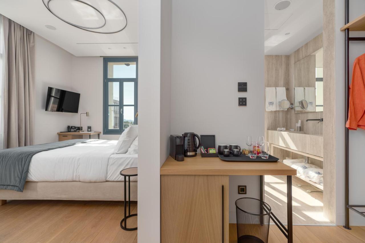 Hellenic Vibes Smart Hotel Atenas Exterior foto A room at the hotel