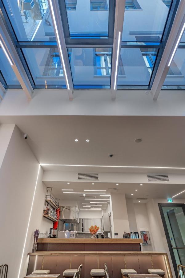 Hellenic Vibes Smart Hotel Atenas Exterior foto Ceiling of the main hall