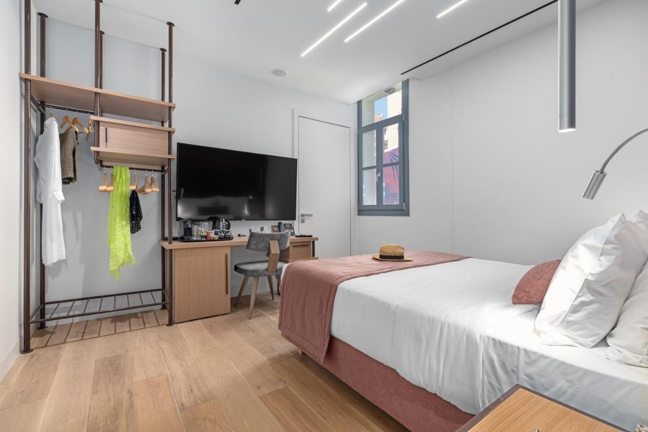 Hellenic Vibes Smart Hotel Atenas Exterior foto A room at the hotel