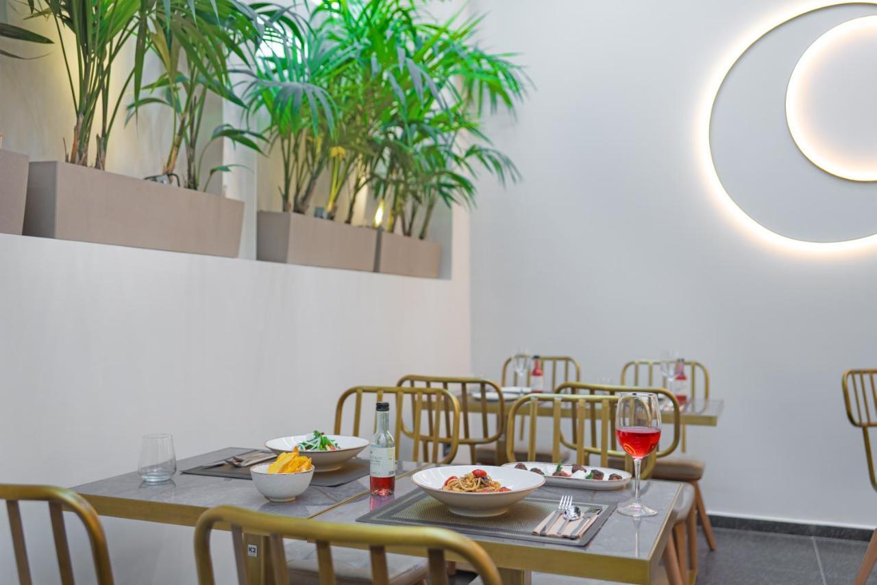 Hellenic Vibes Smart Hotel Atenas Exterior foto Restaurant
