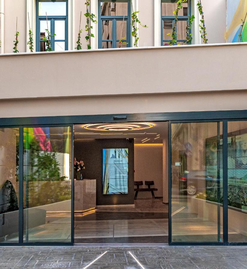 Hellenic Vibes Smart Hotel Atenas Exterior foto Entrance to the hotel
