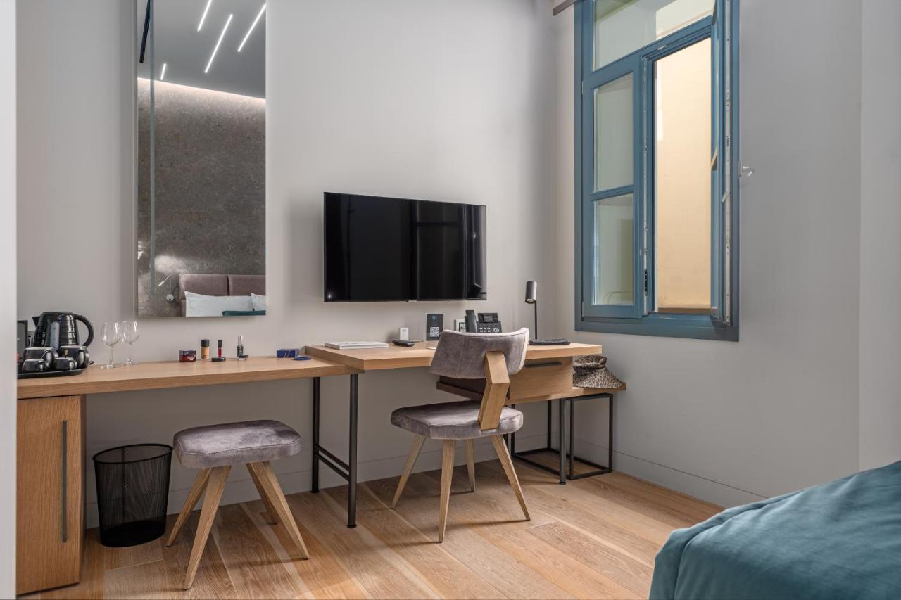 Hellenic Vibes Smart Hotel Atenas Exterior foto A room at the hotel