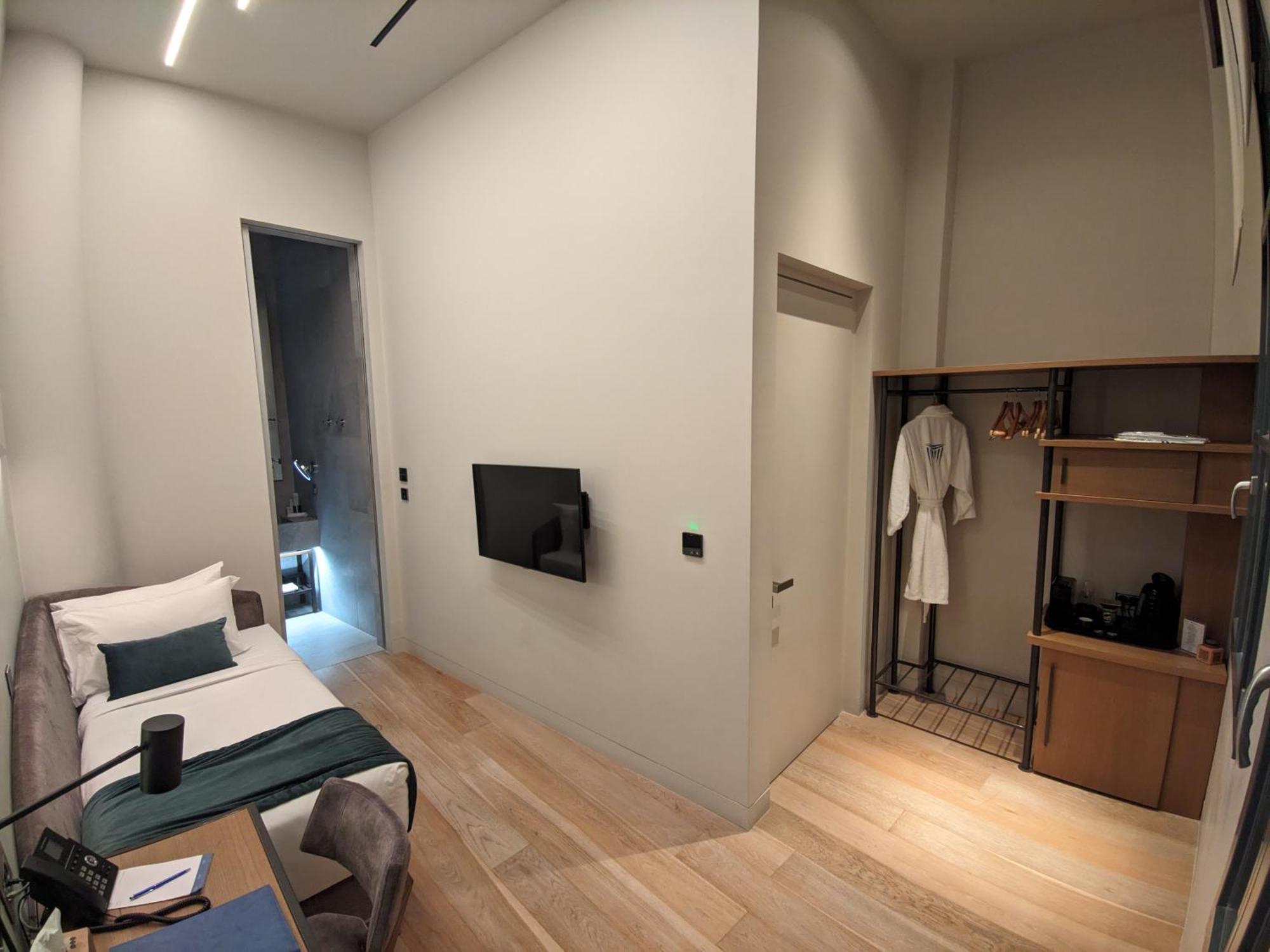 Hellenic Vibes Smart Hotel Atenas Quarto foto A room at the hotel